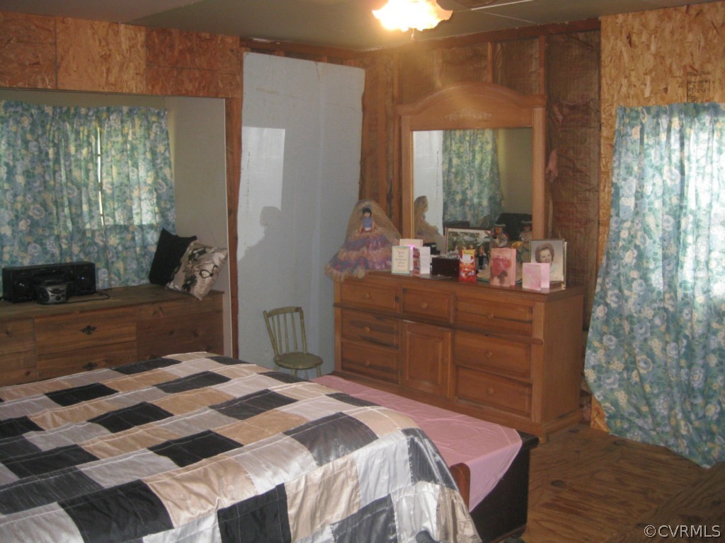 551 Buckskin Road Victoria, VA 23974 - Photo 15 of 18 a bedroom with a bed and a dresser