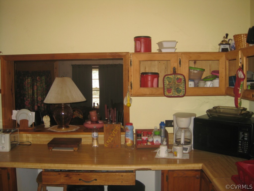 551 Buckskin Road Victoria, VA 23974 - Photo 5 of 18 a kitchen with a counter top space and cabinets