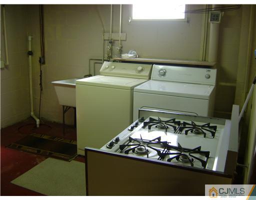 1437 Huron Road North Brunswick, NJ 08902 - Photo 8 of 11 a close up of a sink