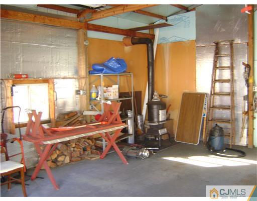 1437 Huron Road North Brunswick, NJ 08902 - Photo 10 of 11 a view of a room with gym equipment