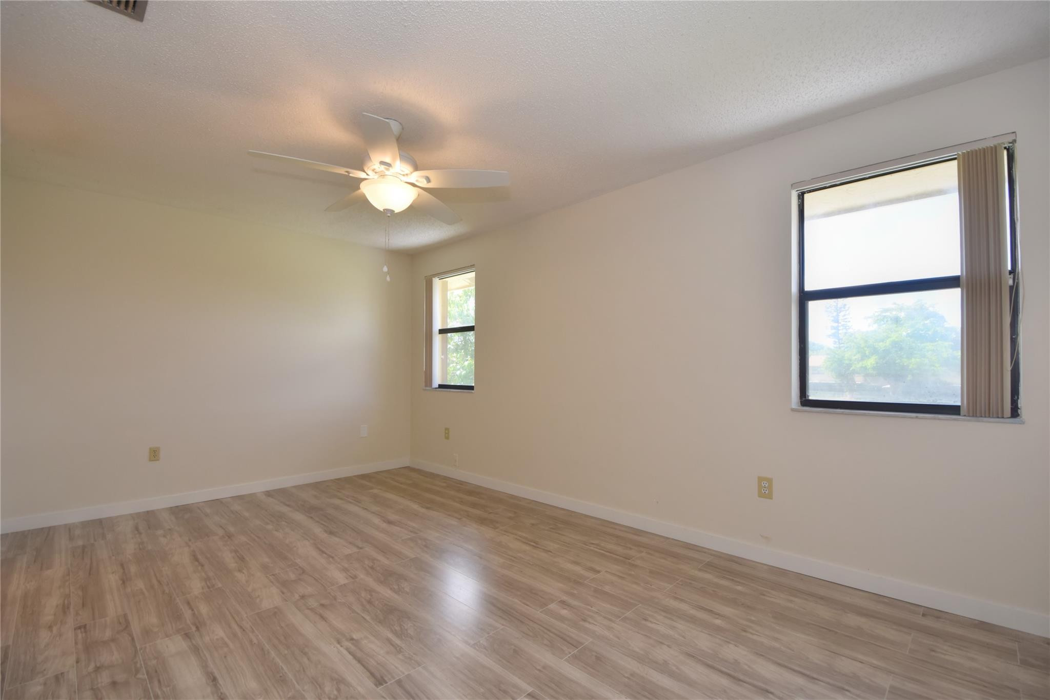 5467 Gate Lake Road, Unit 5467 Tamarac, FL 33319 - Photo 24 of 57 Master Suite