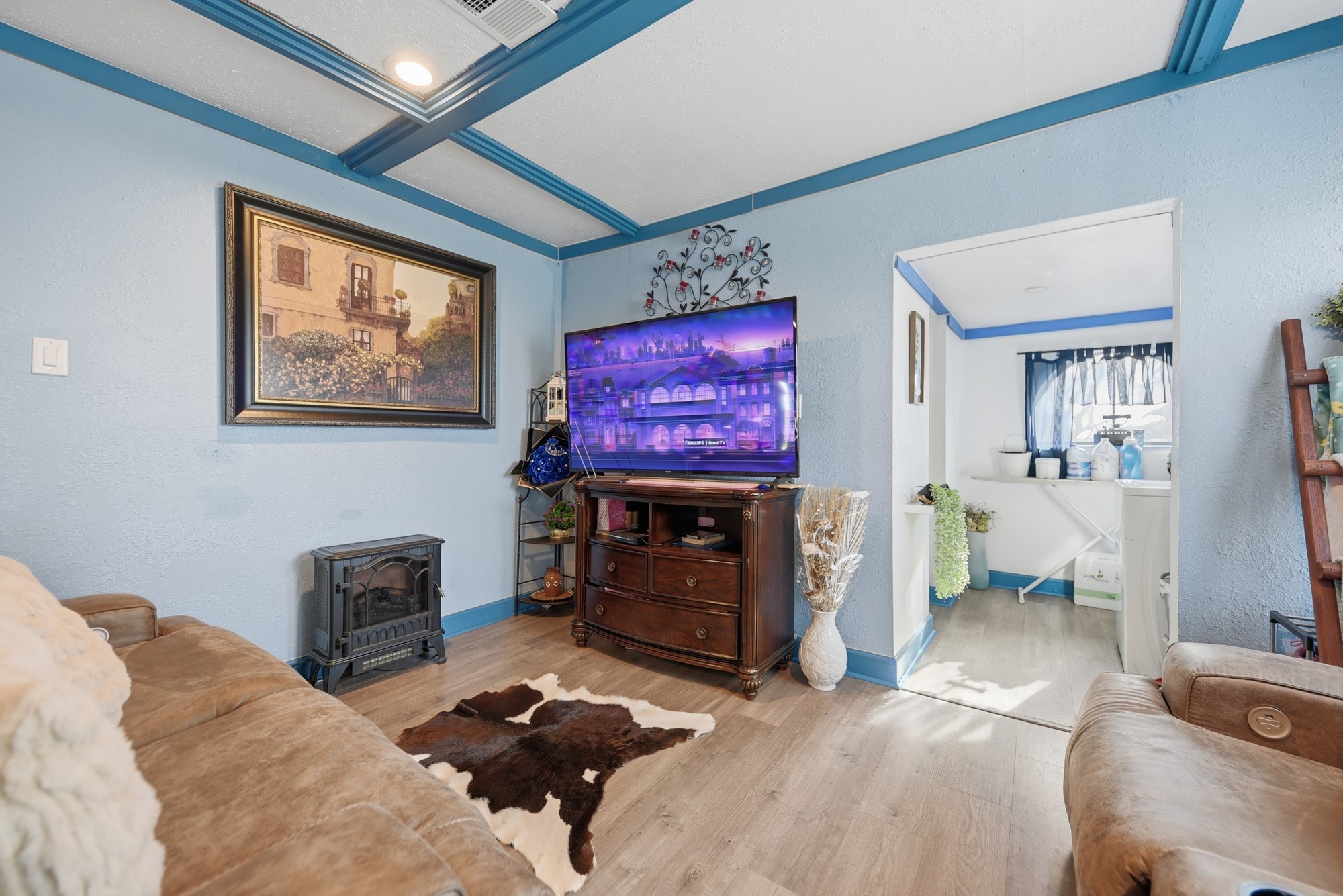 9524 Ferry Road Bellville, TX 77418 - Photo 10 of 15 a living room with furniture and a flat screen tv