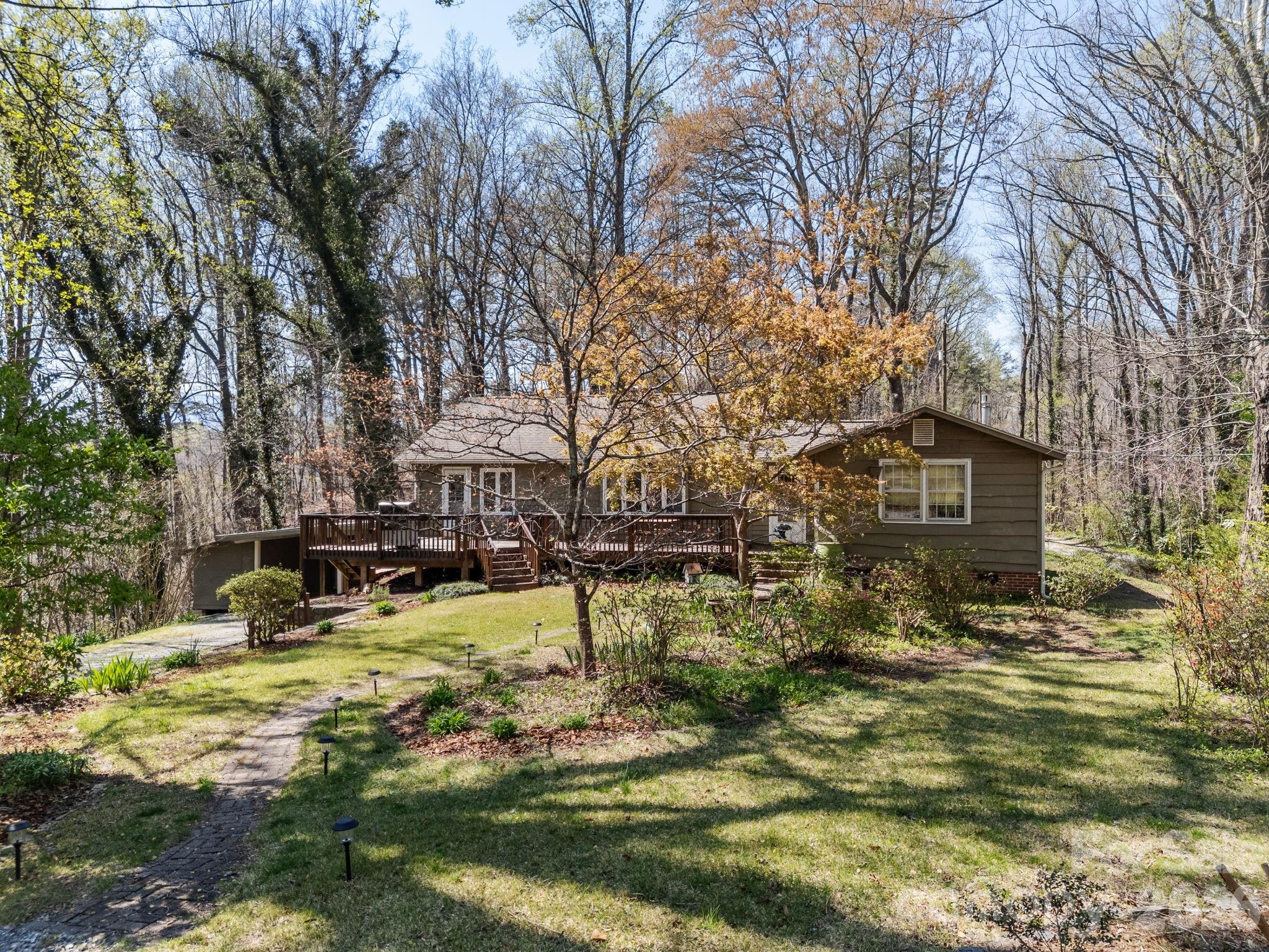 7 Rippy Road Tryon, NC 28782 - Photo 1 of 46 a view of swimming pool with a yard