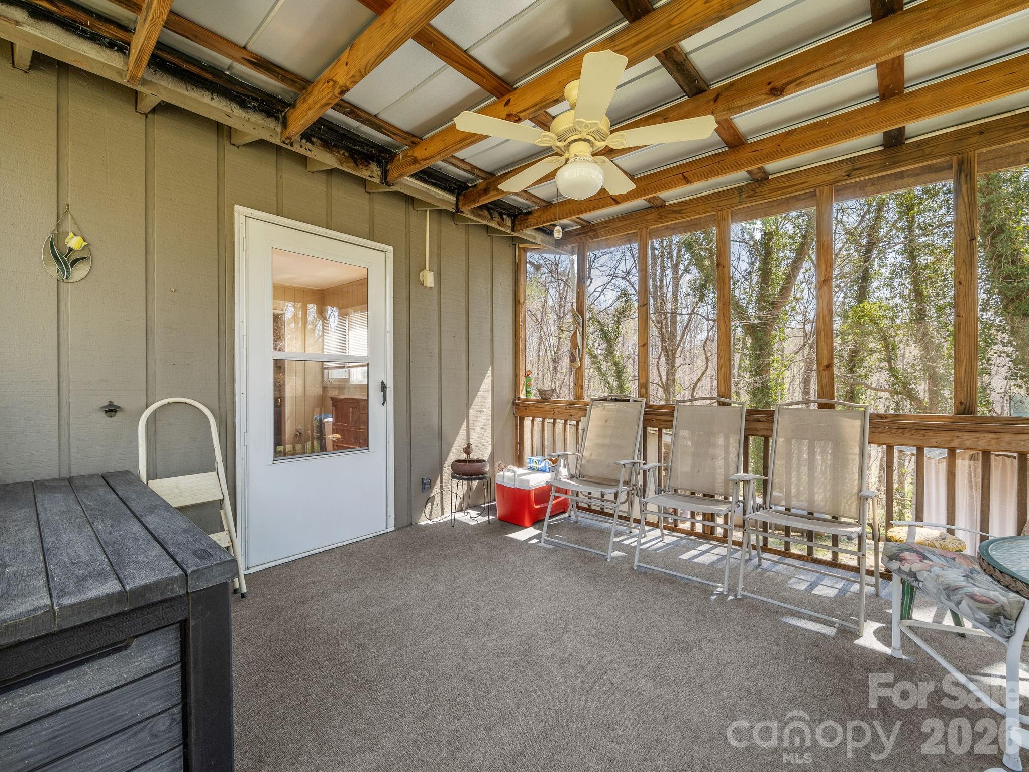 7 Rippy Road Tryon, NC 28782 - Photo 11 of 46 a room with large windows
