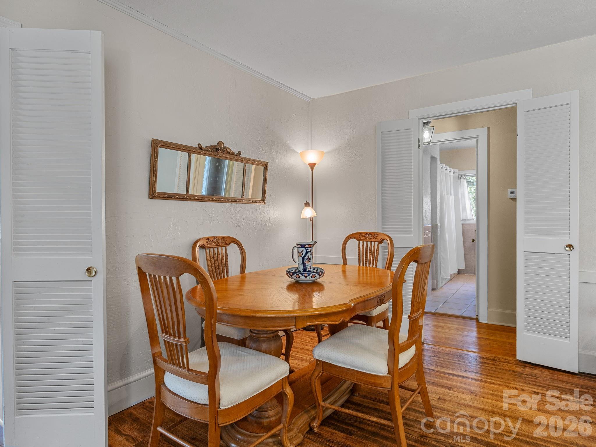 7 Rippy Road Tryon, NC 28782 - Photo 24 of 46 a view of a a dining room with furniture and wooden floor