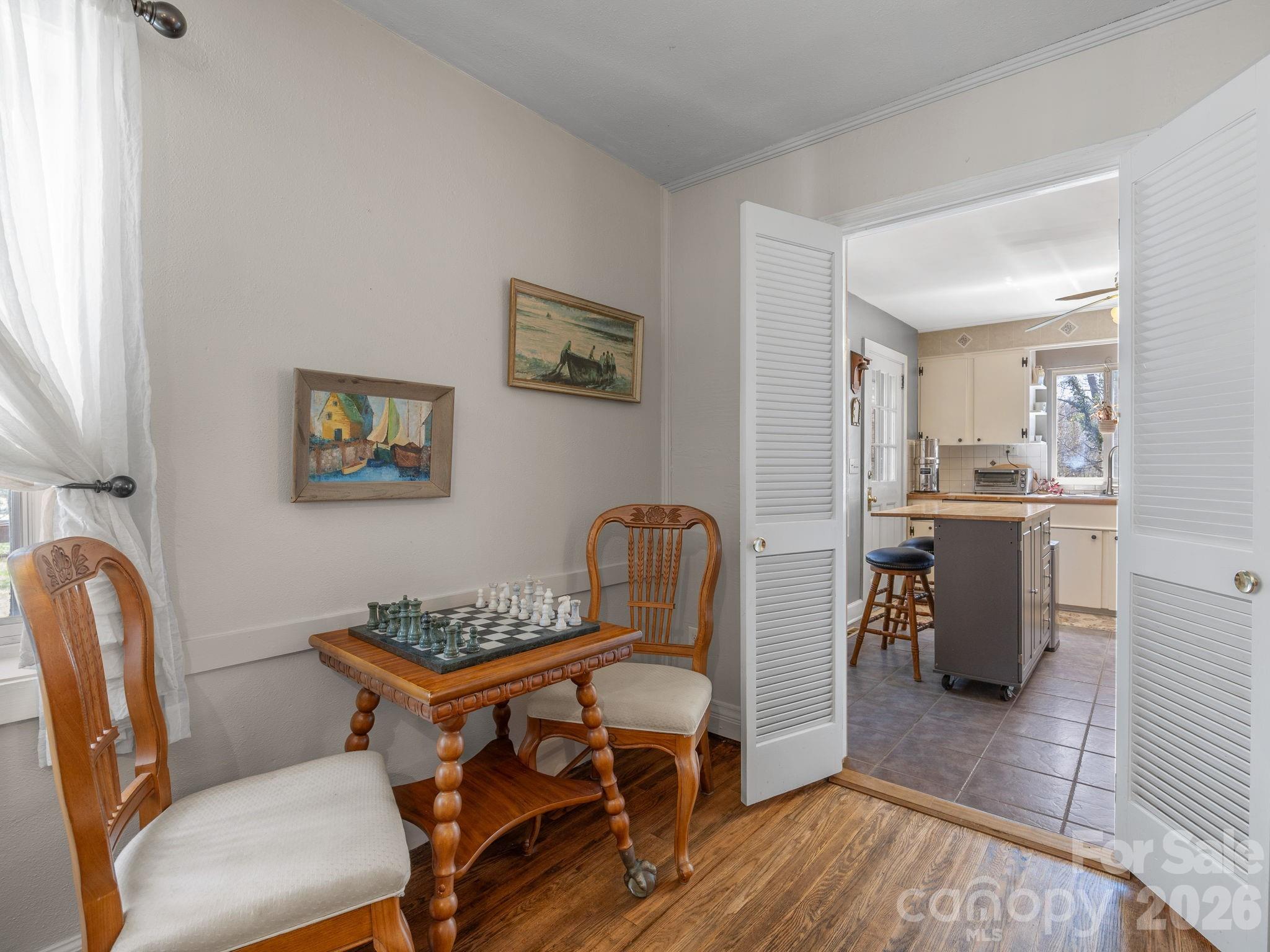 7 Rippy Road Tryon, NC 28782 - Photo 25 of 46 a view of a workspace with furniture and wooden floor