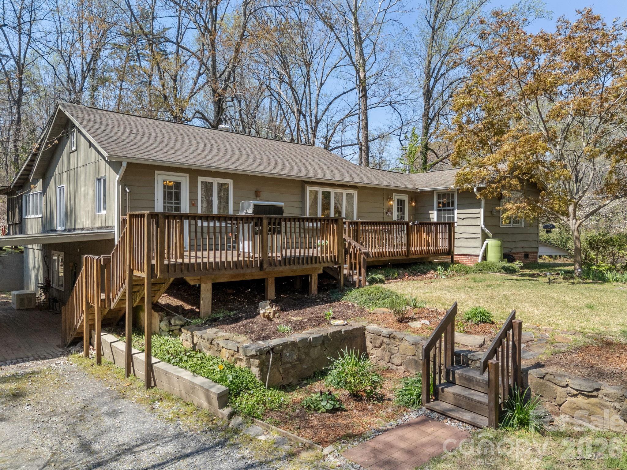 7 Rippy Road Tryon, NC 28782 - Photo 3 of 46 a view of a house with a yard