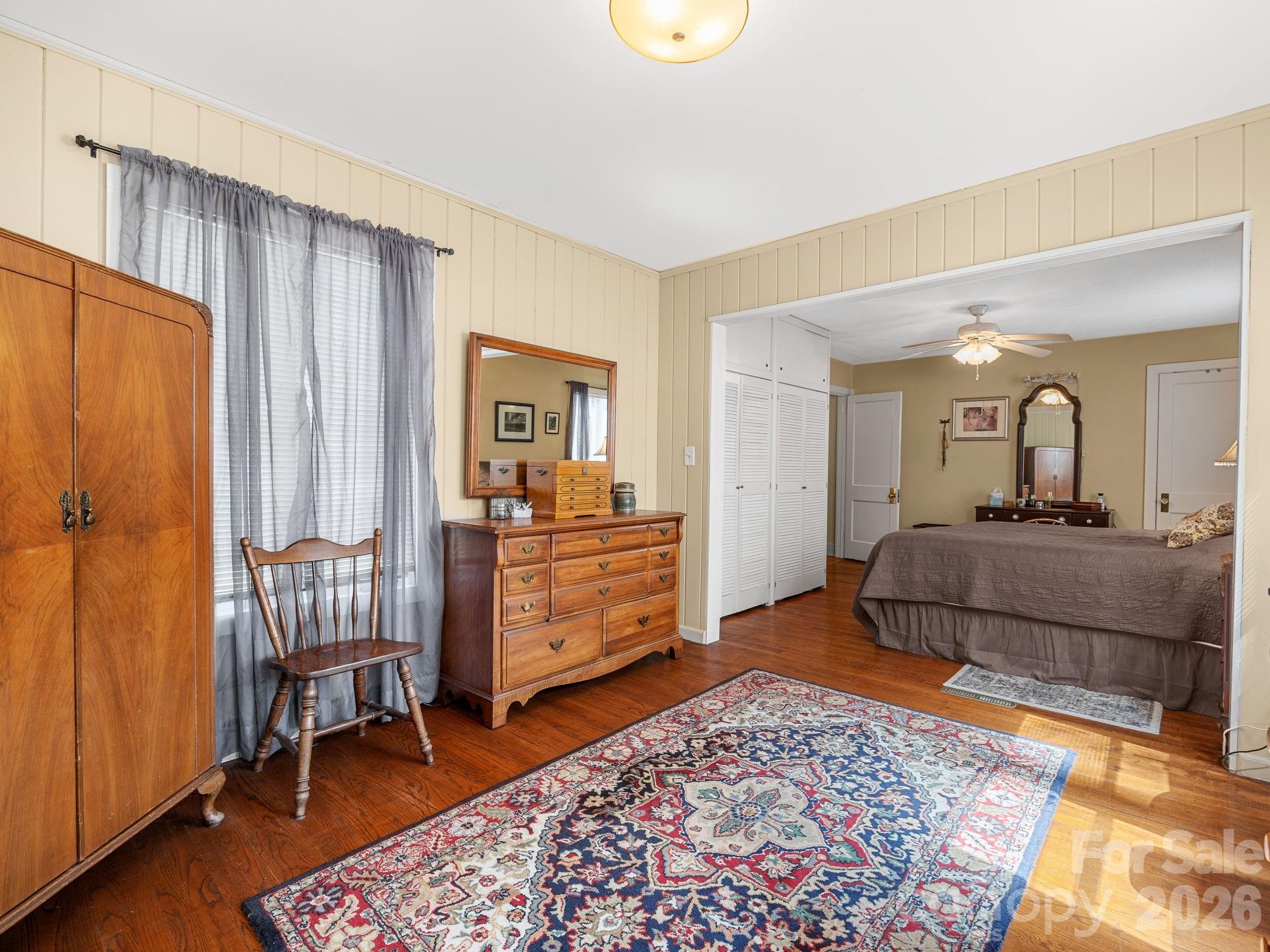 7 Rippy Road Tryon, NC 28782 - Photo 37 of 46 a bedroom with a bed and wooden floor