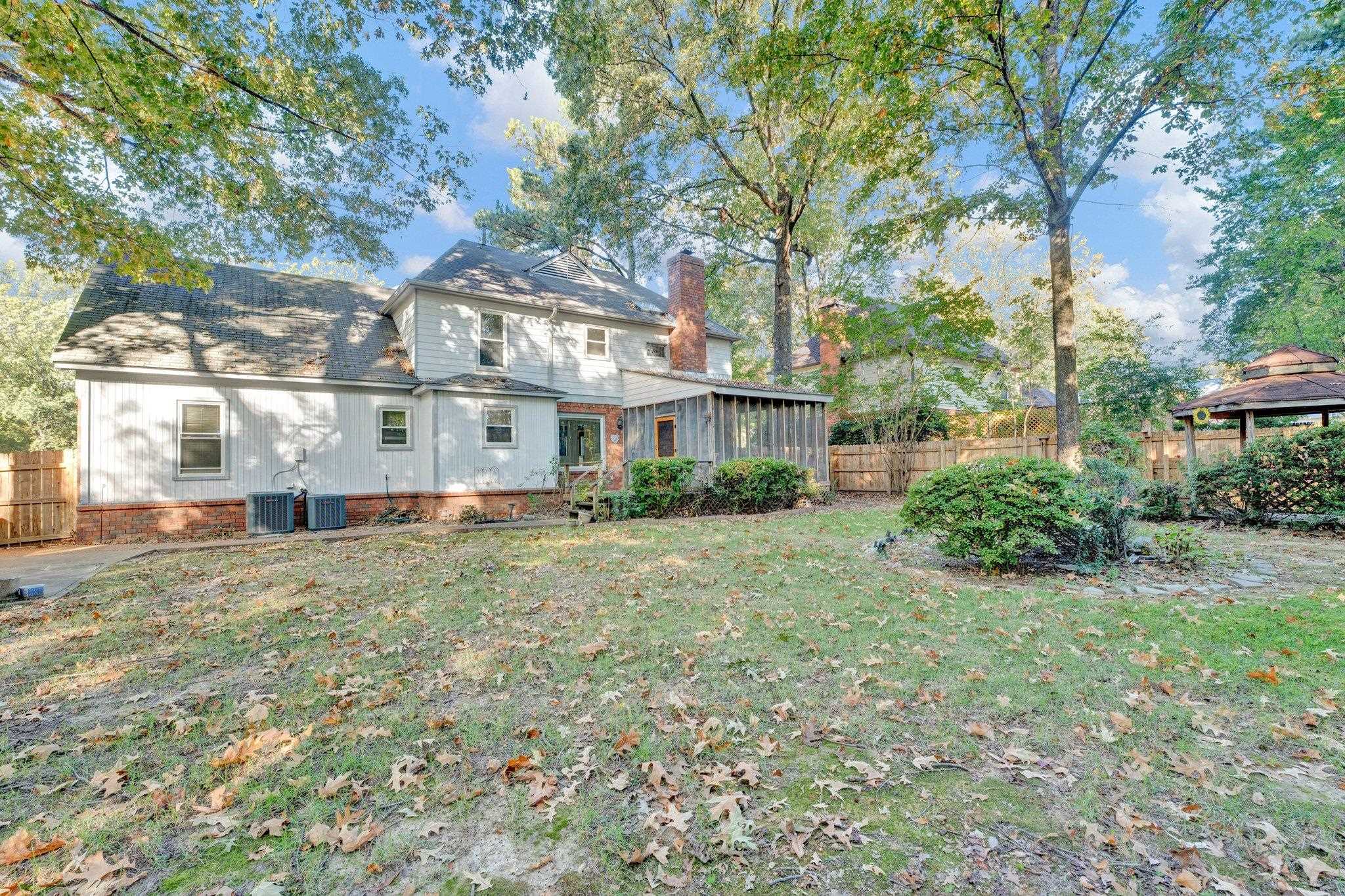 3656 Beaver Run Drive Collierville, TN 38017 - Photo 19 of 24 a view of a big house with a big yard and large tree