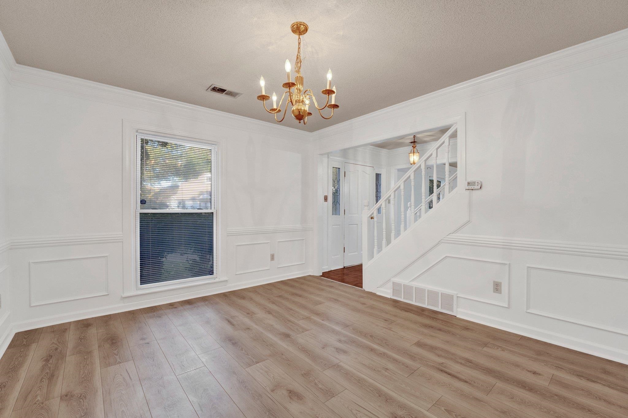 3656 Beaver Run Drive Collierville, TN 38017 - Photo 3 of 24 wooden floor in an empty room with a window