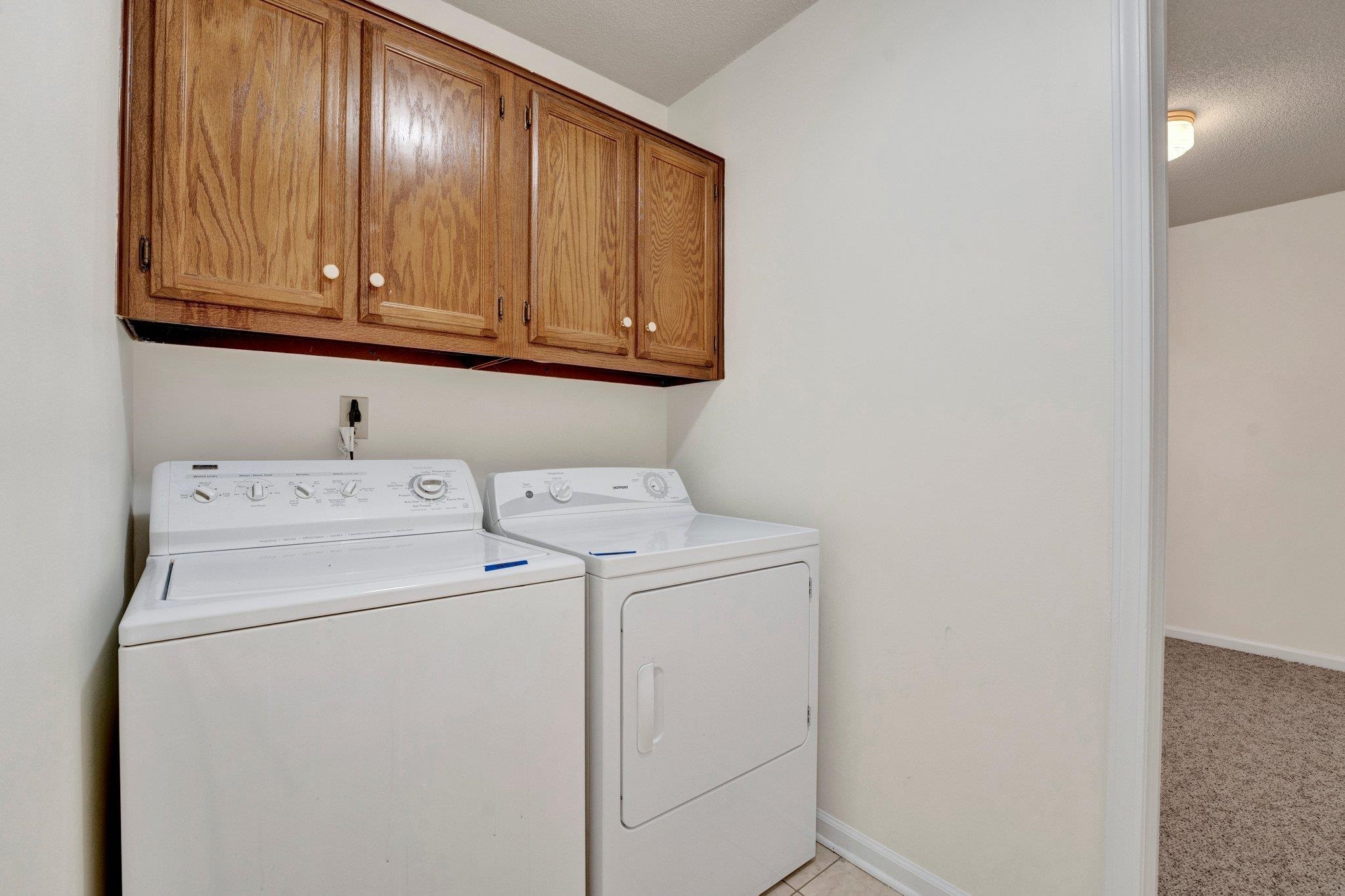 3656 Beaver Run Drive Collierville, TN 38017 - Photo 9 of 24 a utility room with dryer and washer