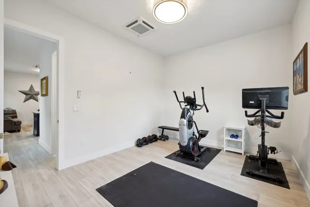 a view of a room with gym equipment