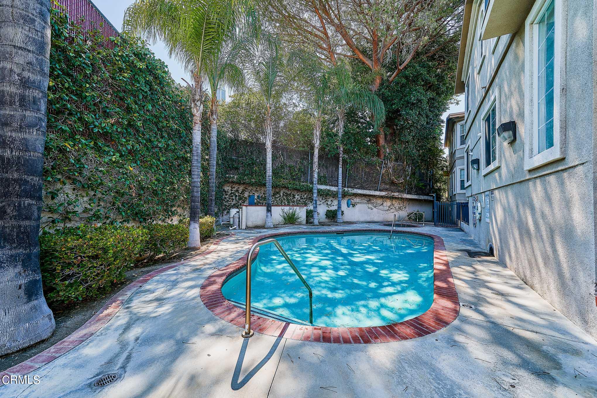 4516 Ramsdell Avenue, Unit 124 La Crescenta, CA 91214 - Photo 5 of 5 a view of a swimming pool with sitting area