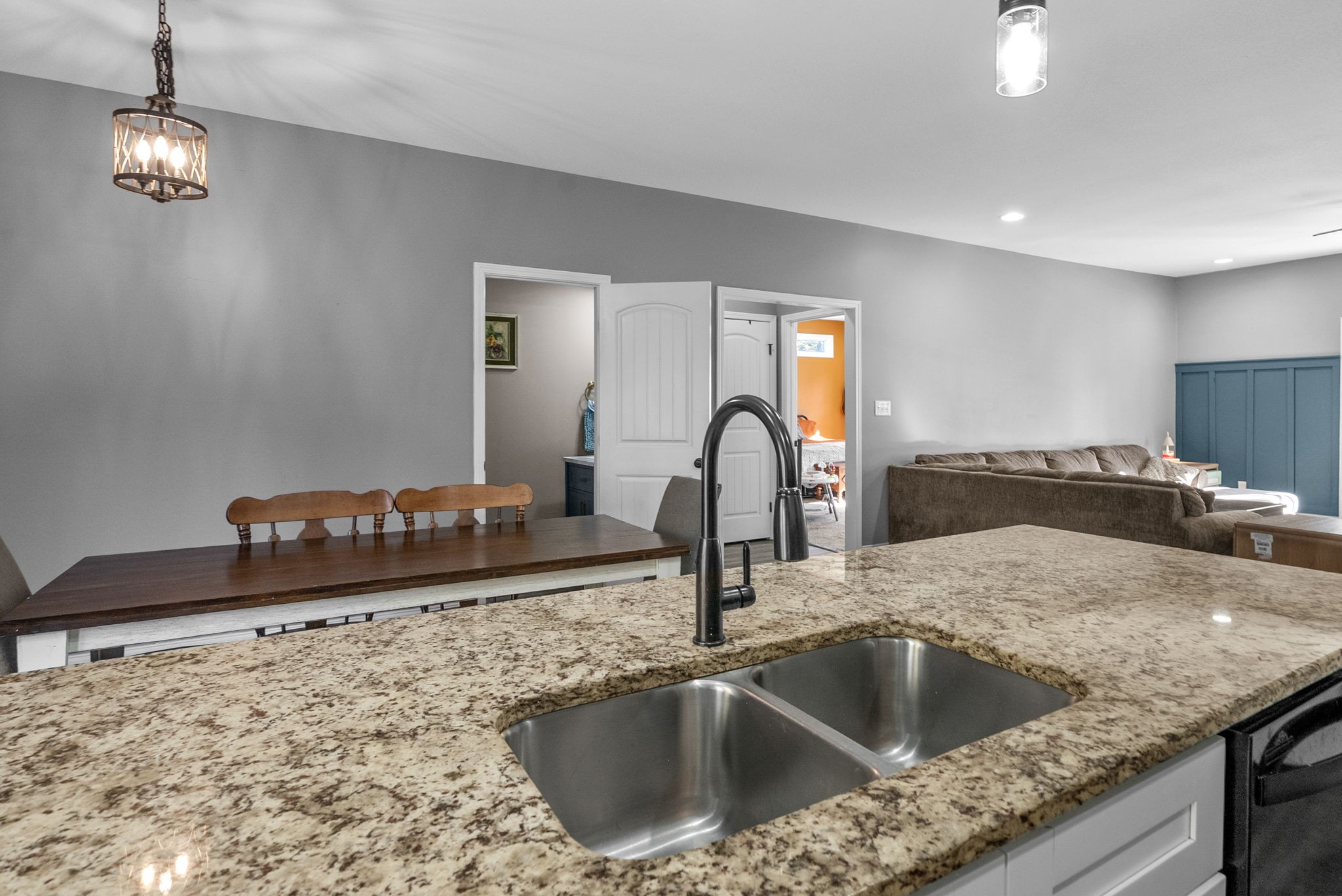 4553 Cumberland City Road Indian Mound, TN 37079 - Photo 14 of 44 a kitchen with a granite countertop sink a stove and a refrigerator