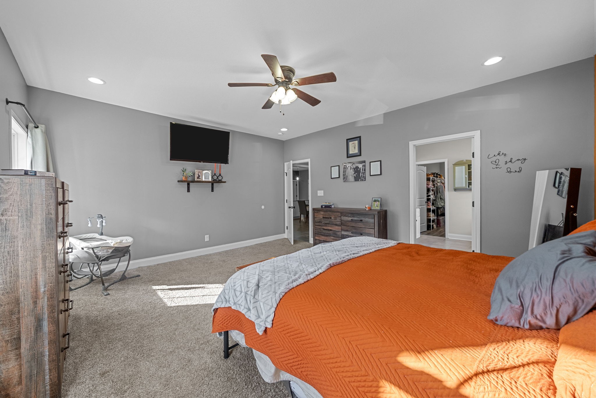 4553 Cumberland City Road Indian Mound, TN 37079 - Photo 19 of 44 a bedroom with a bed and a flat screen tv