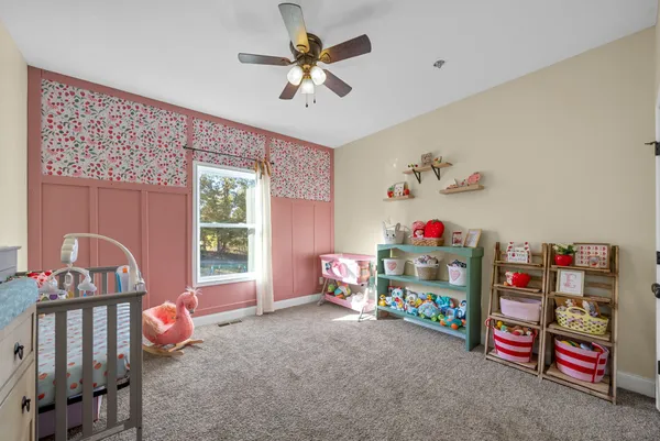 a play room with lots of furniture