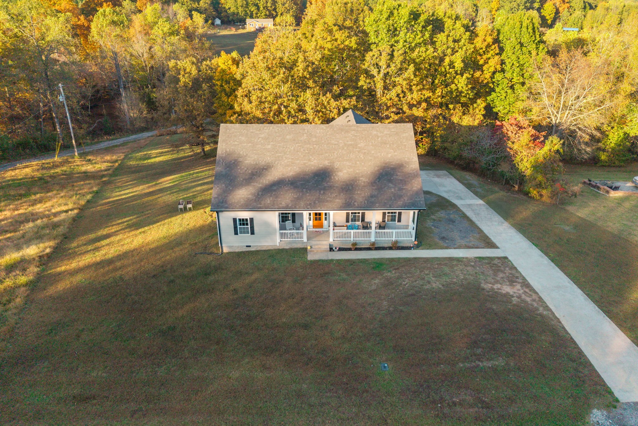 4553 Cumberland City Road Indian Mound, TN 37079 - Photo 39 of 44 a view of a big yard with large trees