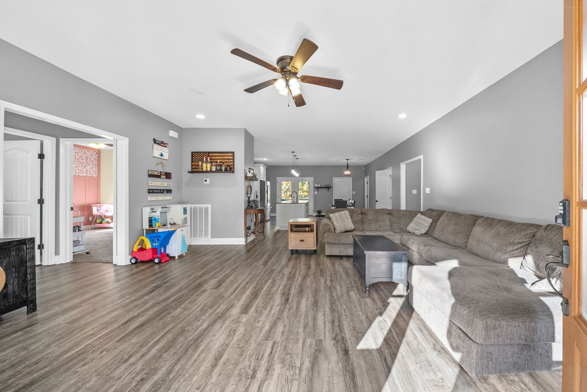 4553 Cumberland City Road Indian Mound, TN 37079 - Photo 6 of 44 a living room with furniture and a wooden floor
