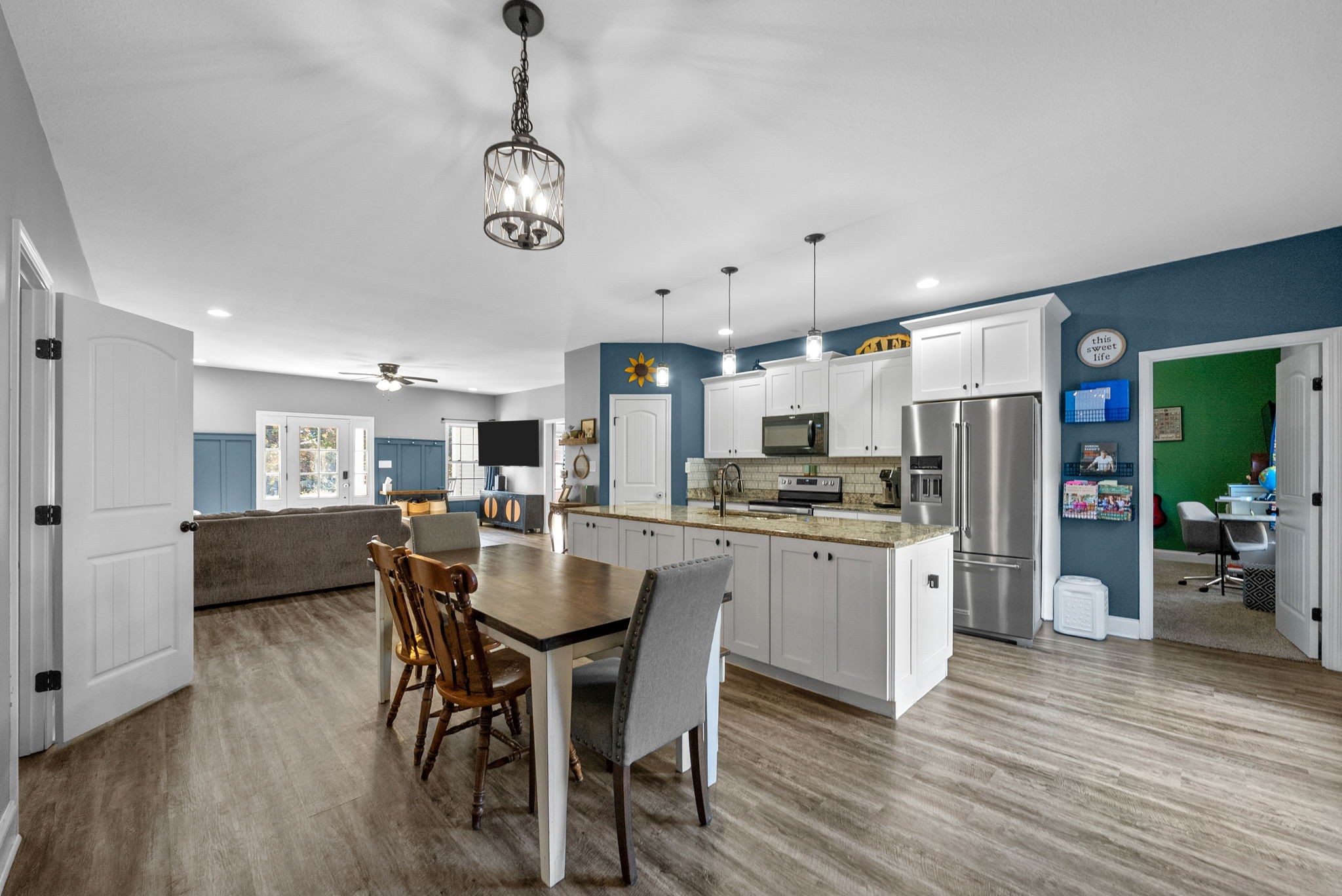 4553 Cumberland City Road Indian Mound, TN 37079 - Photo 10 of 44 a view of a dining room with furniture window and wooden floor