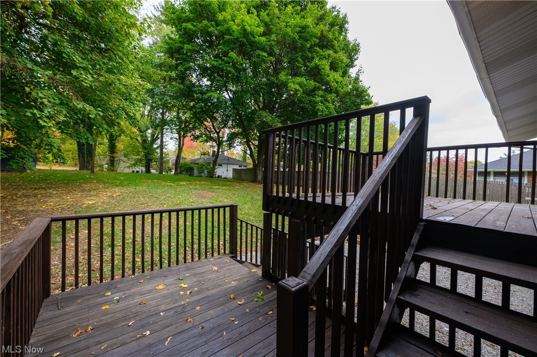 279 South Messner Road New Franklin, OH 44319 - Photo 26 of 30 Deck featuring a yard