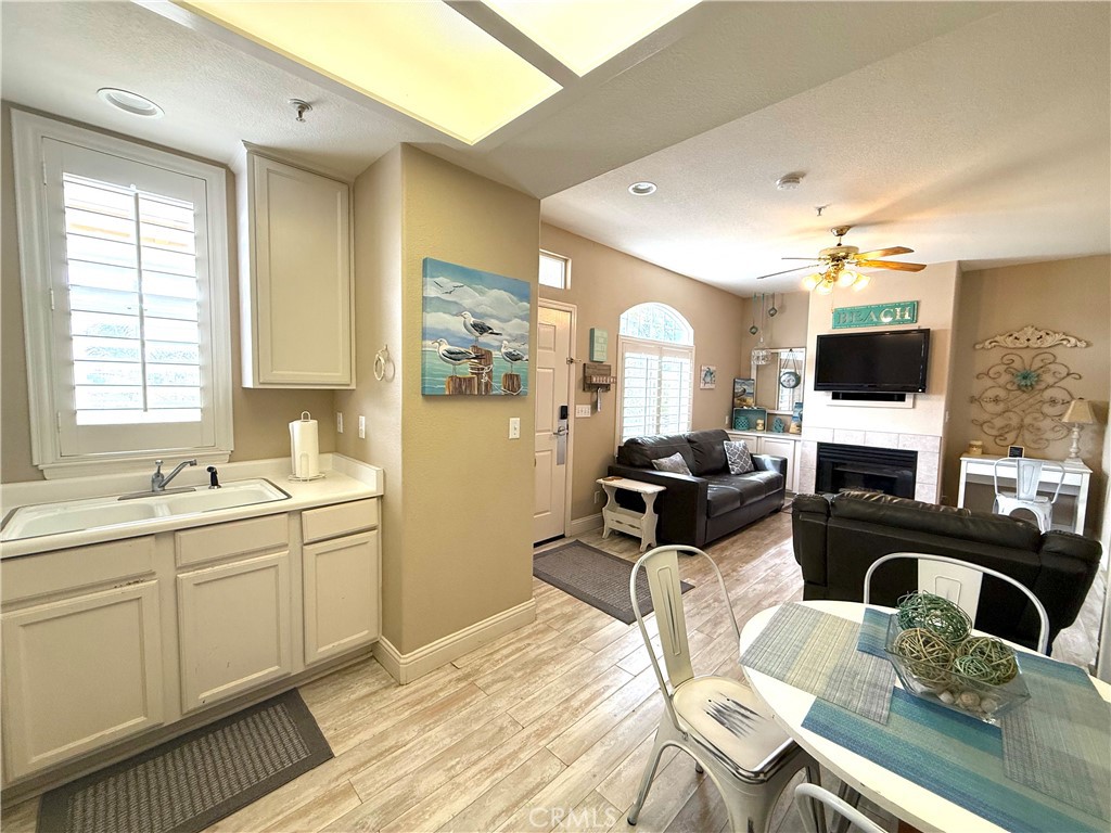 444 Pier Avenue, Unit 44 Oceano, CA 93445 - Photo 1 of 17 a living room with furniture a flat screen tv and a window