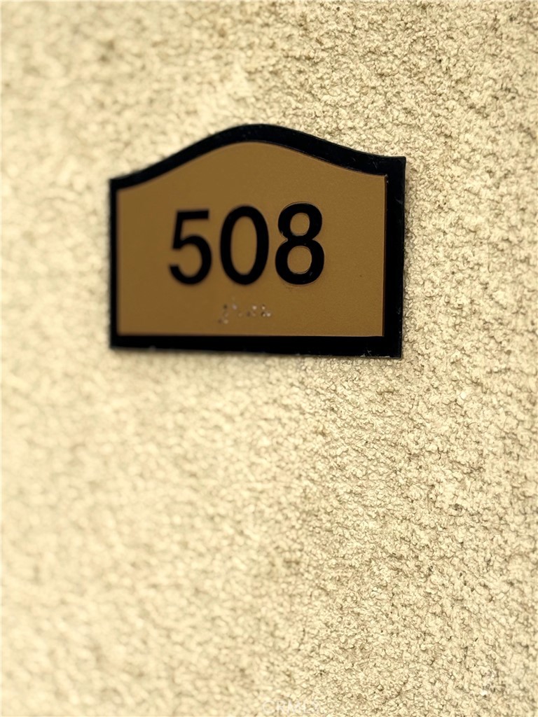 444 Pier Avenue, Unit 44 Oceano, CA 93445 - Photo 13 of 17 a blue sign that is on a wooden floor