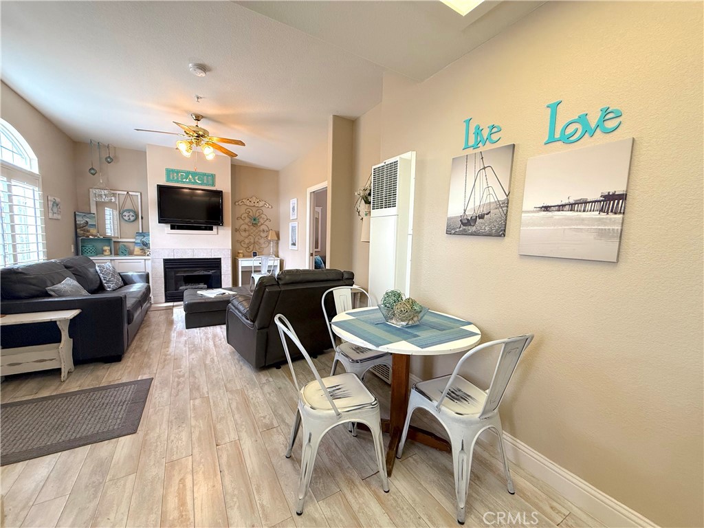 444 Pier Avenue, Unit 44 Oceano, CA 93445 - Photo 4 of 17 a view of a livingroom with furniture and a flat screen tv