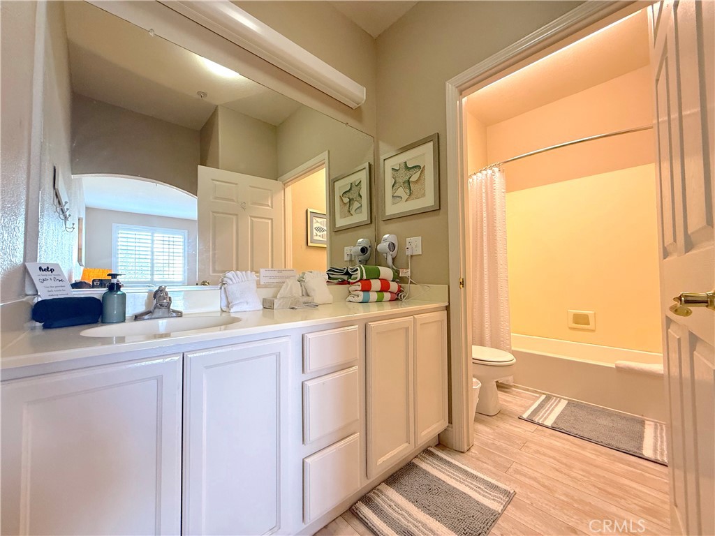 444 Pier Avenue, Unit 44 Oceano, CA 93445 - Photo 10 of 17 a spacious bathroom with a sink a mirror and a shower