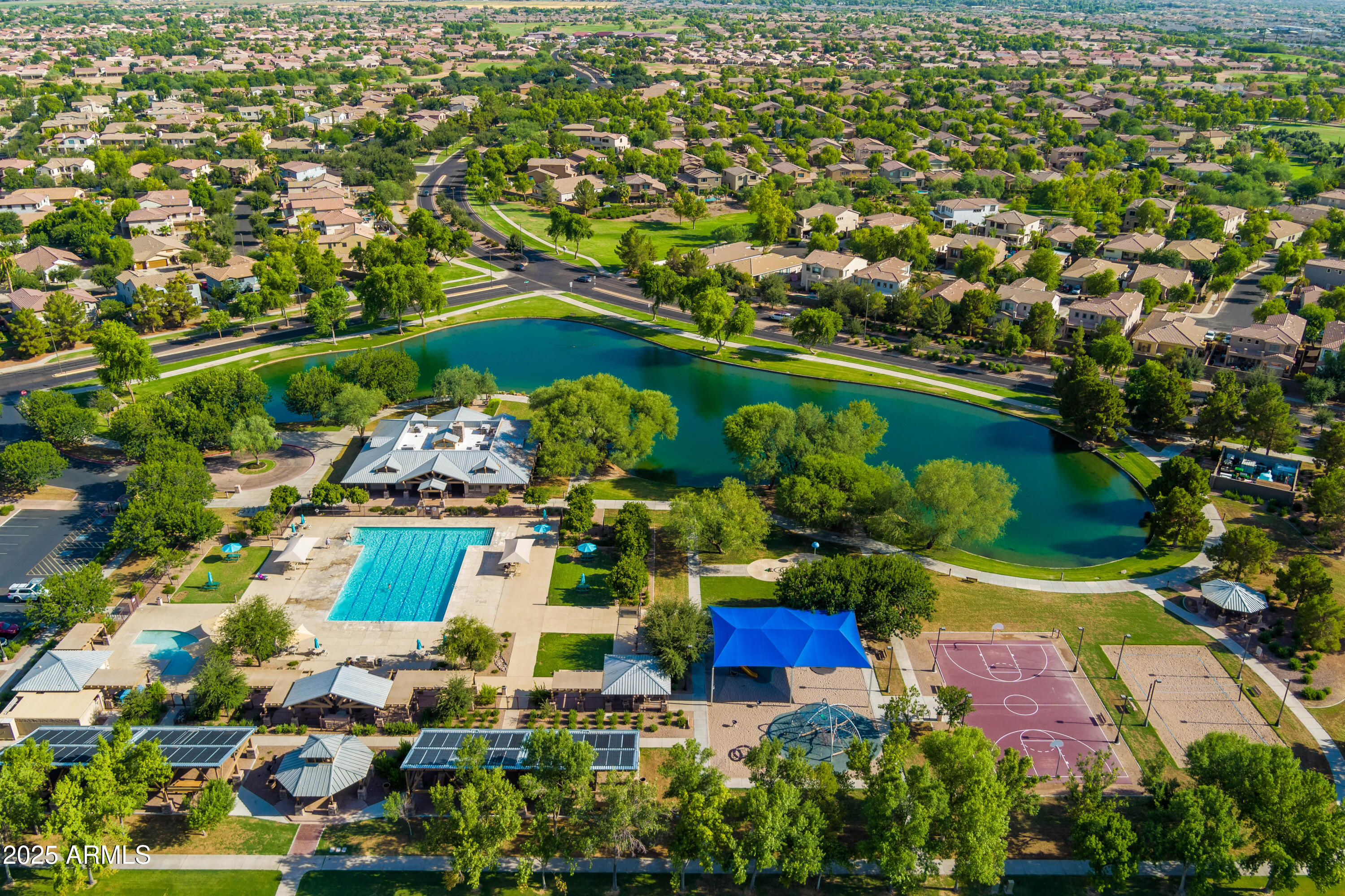 4140 East Claxton Avenue Gilbert, AZ 85297 - Photo 103 of 117 an aerial view of residential houses with outdoor space and street view