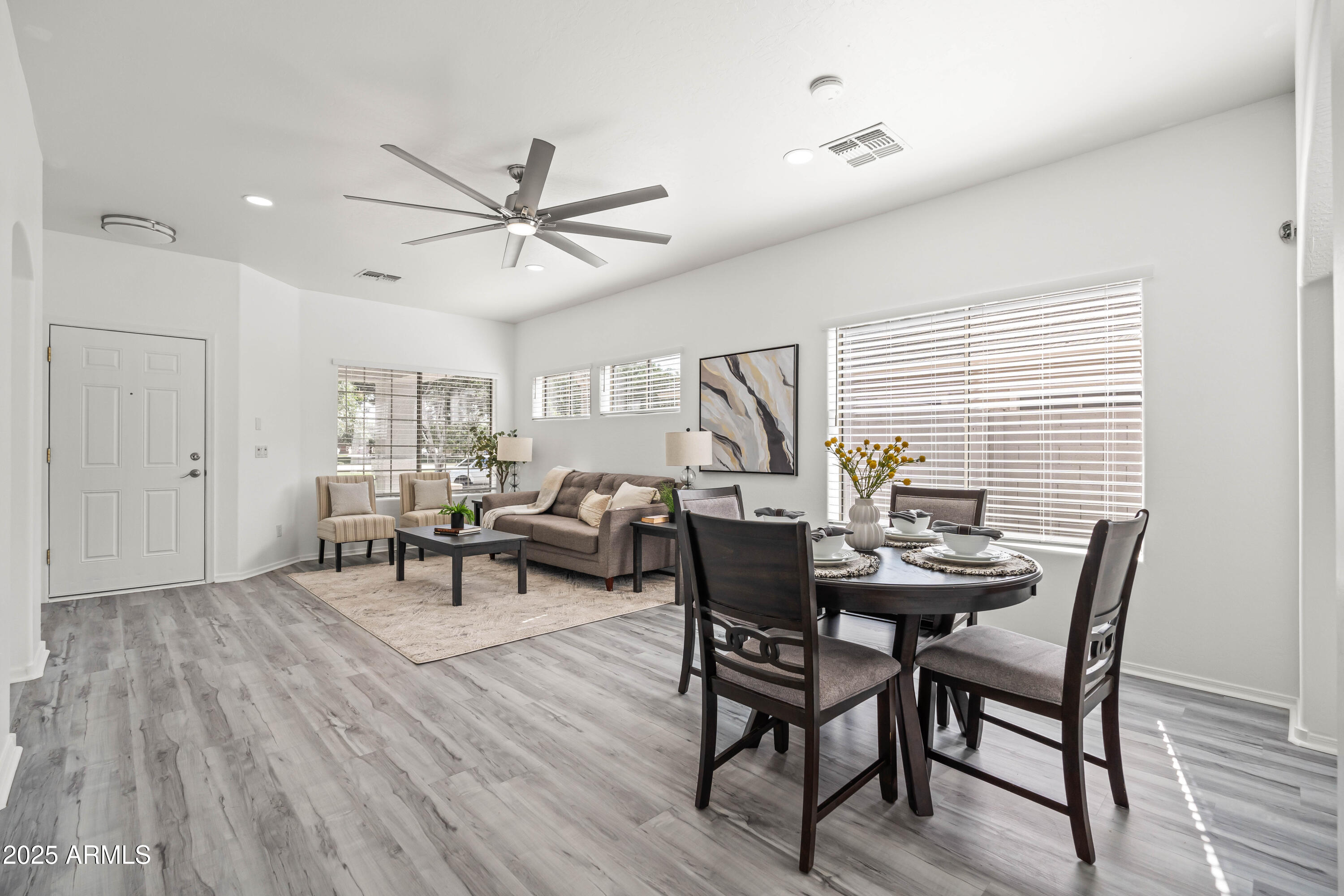 4140 East Claxton Avenue Gilbert, AZ 85297 - Photo 17 of 112 a view of a livingroom and dining room