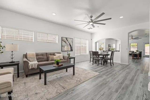 a kitchen with a sink a stove and cabinets