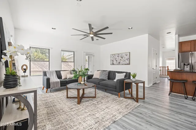 a view of a swimming pool with an outdoor space and seating area