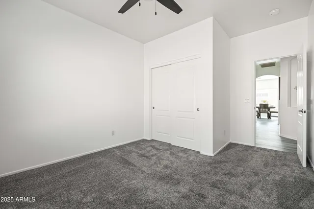 an aerial view of residential houses with outdoor space and street view