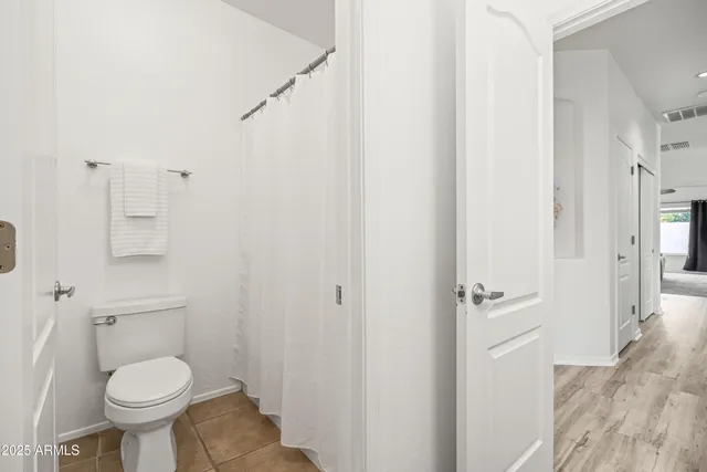 a view of swimming pool with outdoor seating and trees