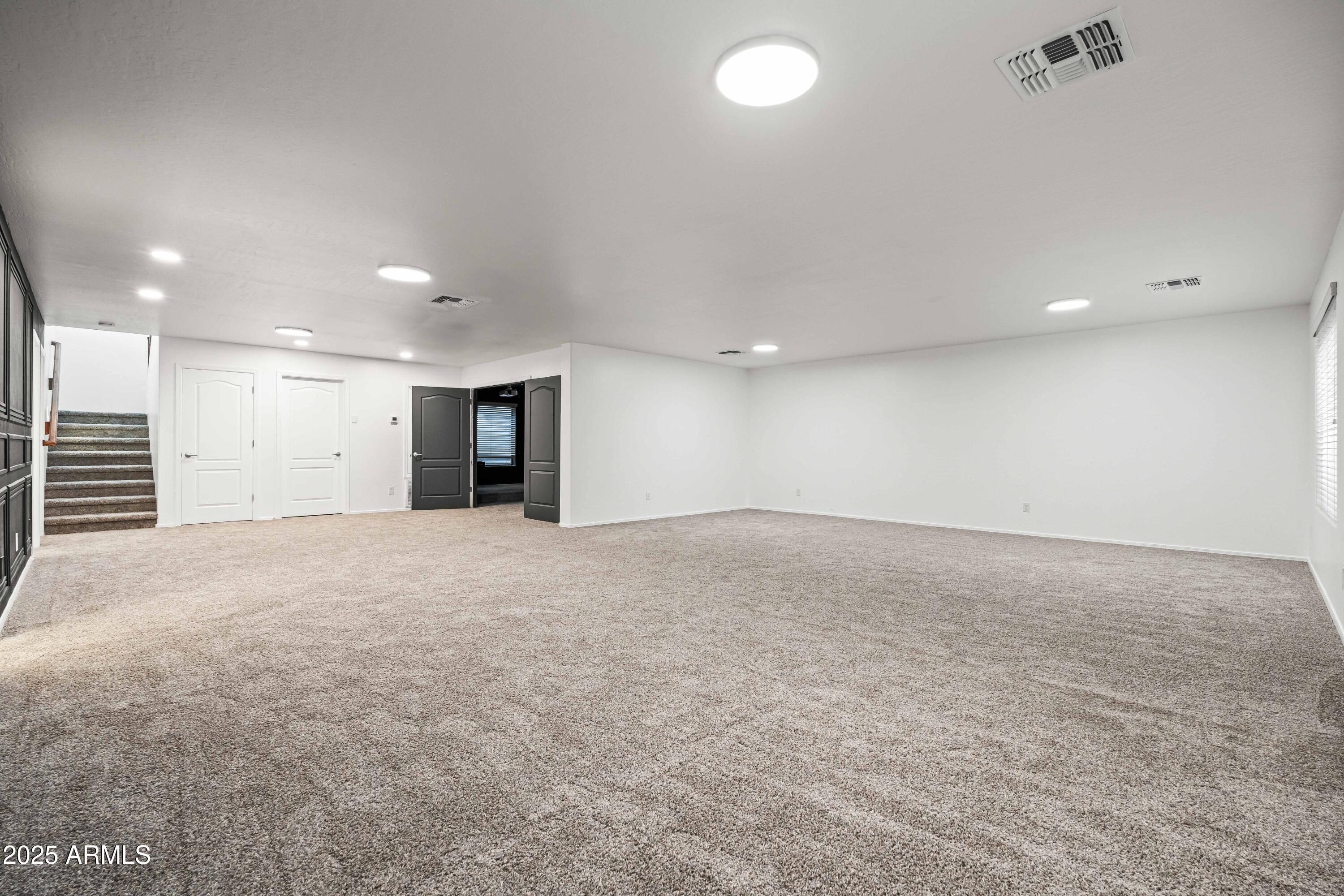 4140 East Claxton Avenue Gilbert, AZ 85297 - Photo 50 of 112 an empty room with an empty space & kitchen space