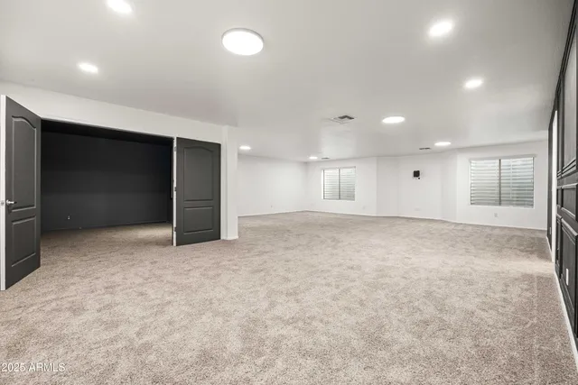 a view of a house with a yard and plants