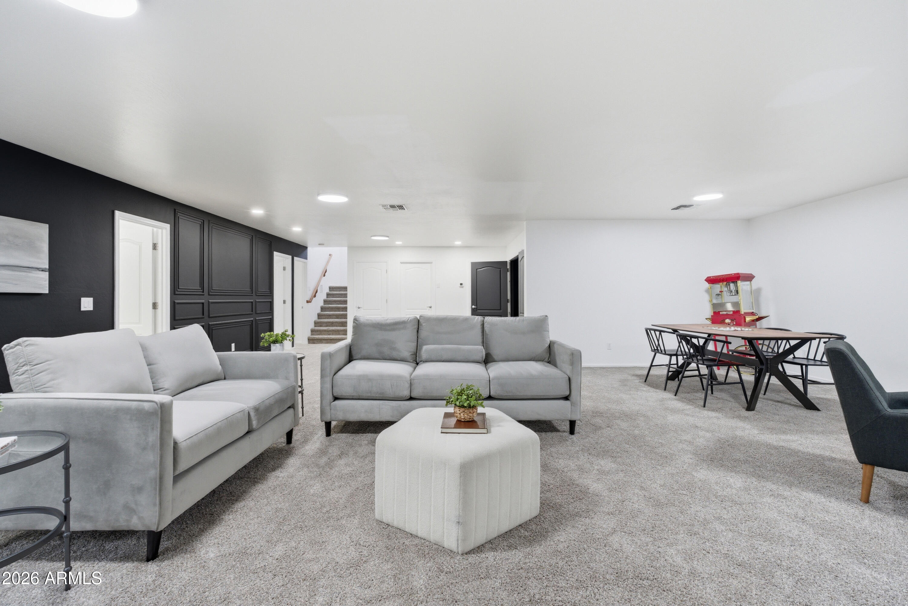 4140 East Claxton Avenue Gilbert, AZ 85297 - Photo 54 of 117 a living room with furniture and a large window