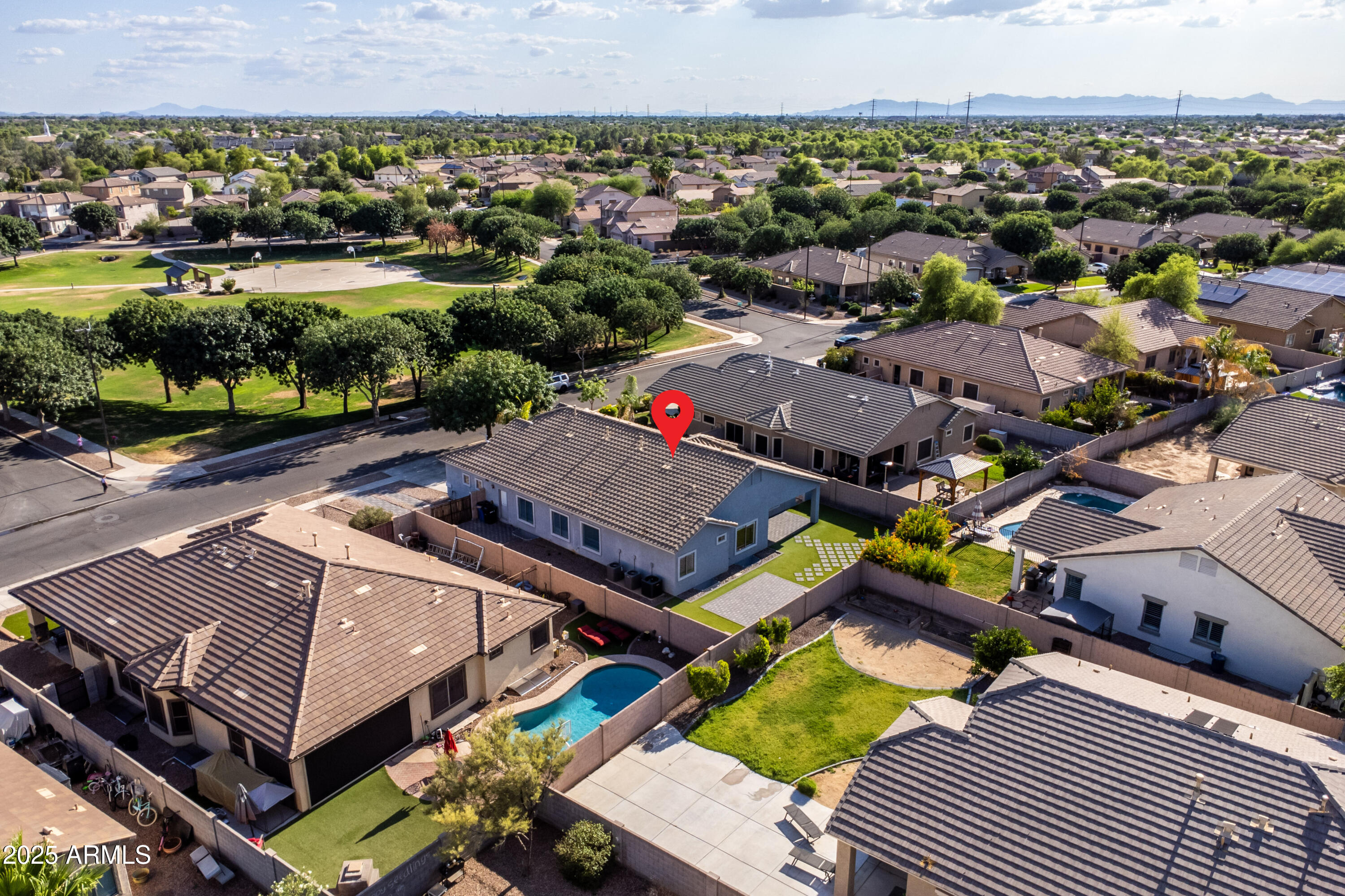 4140 East Claxton Avenue Gilbert, AZ 85297 - Photo 77 of 112 an aerial view of a house with a garden