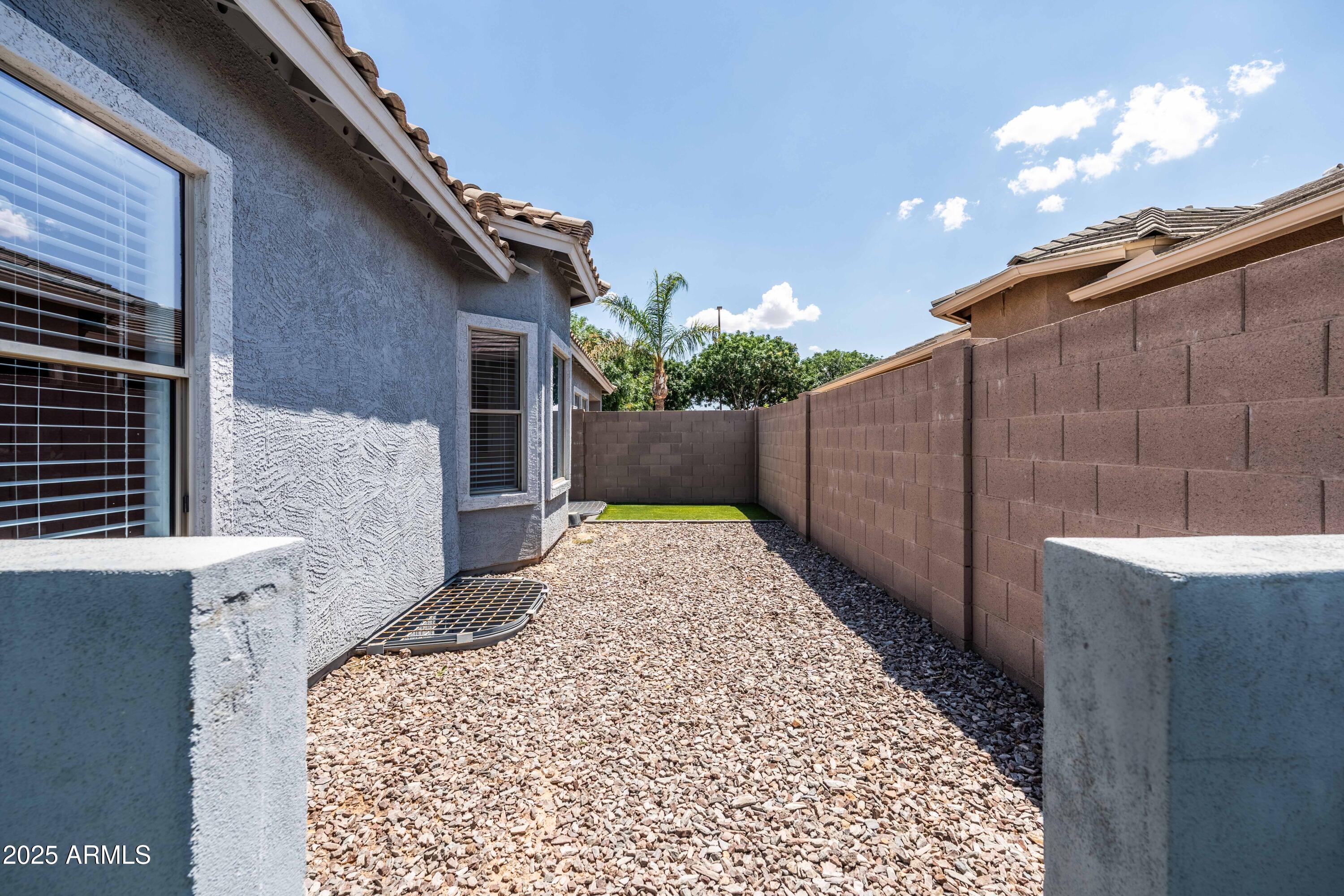 4140 East Claxton Avenue Gilbert, AZ 85297 - Photo 78 of 117 a view of a backyard