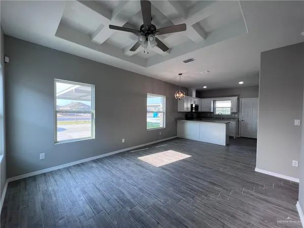 a view of kitchen and windows