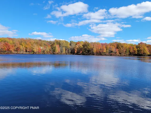 a childrens park with lots of swings and slides