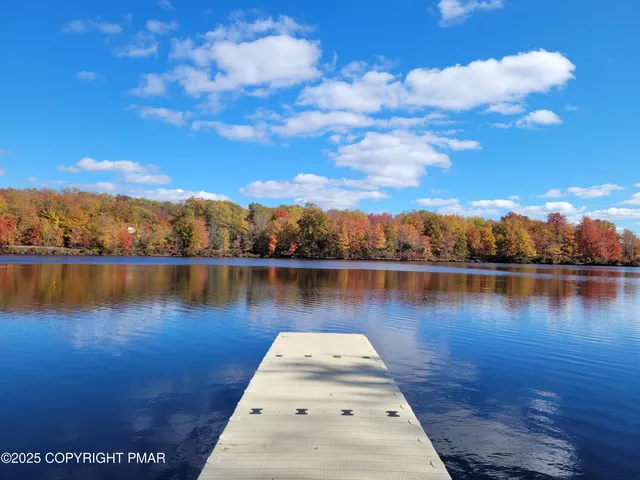 a view of lake with mountain