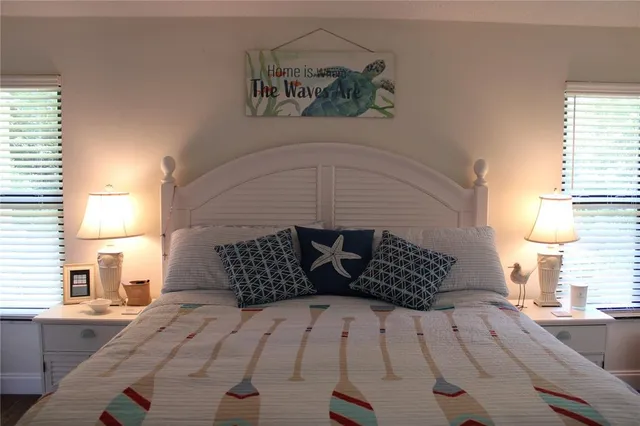 a kitchen with granite countertop a sink and cabinets