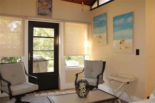 a front view of a house with lots of green space