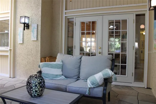 a view of a swimming pool with a patio