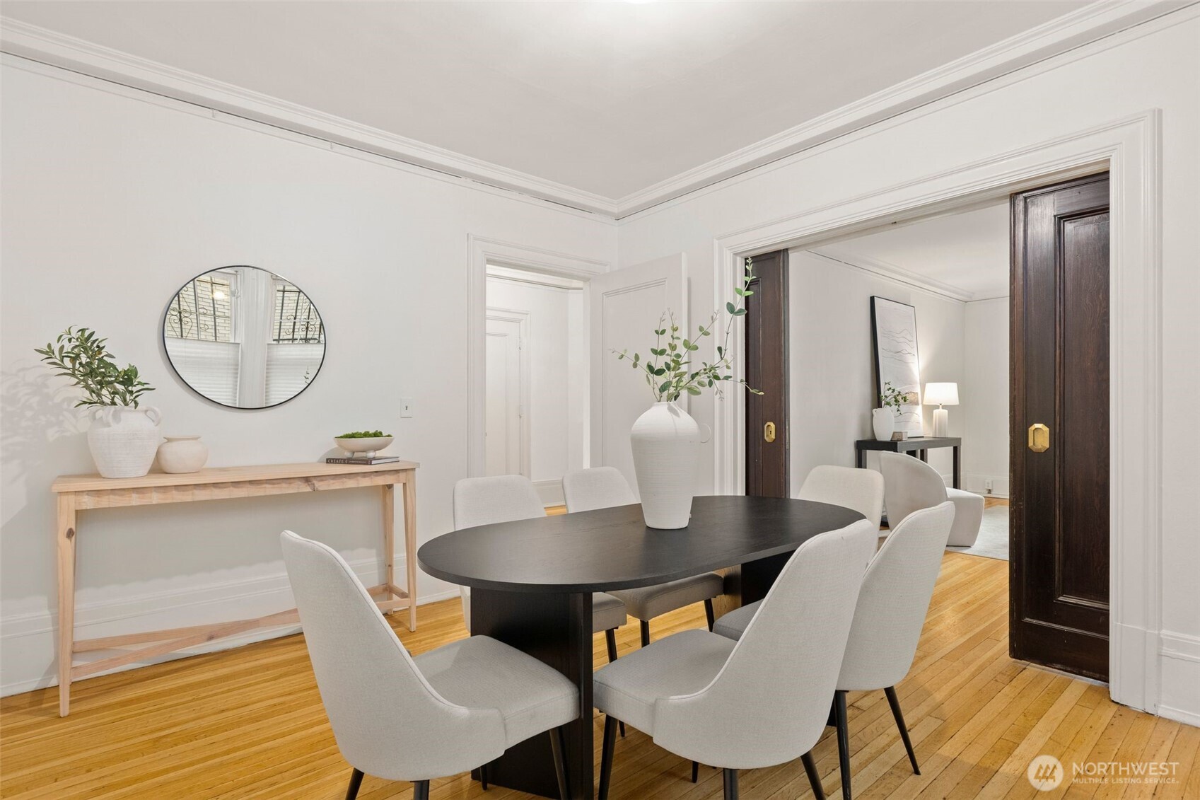 615 Boren Avenue, Unit 6 Seattle, WA 98104 - Photo 11 of 26 a view of a dining room with furniture and wooden floor