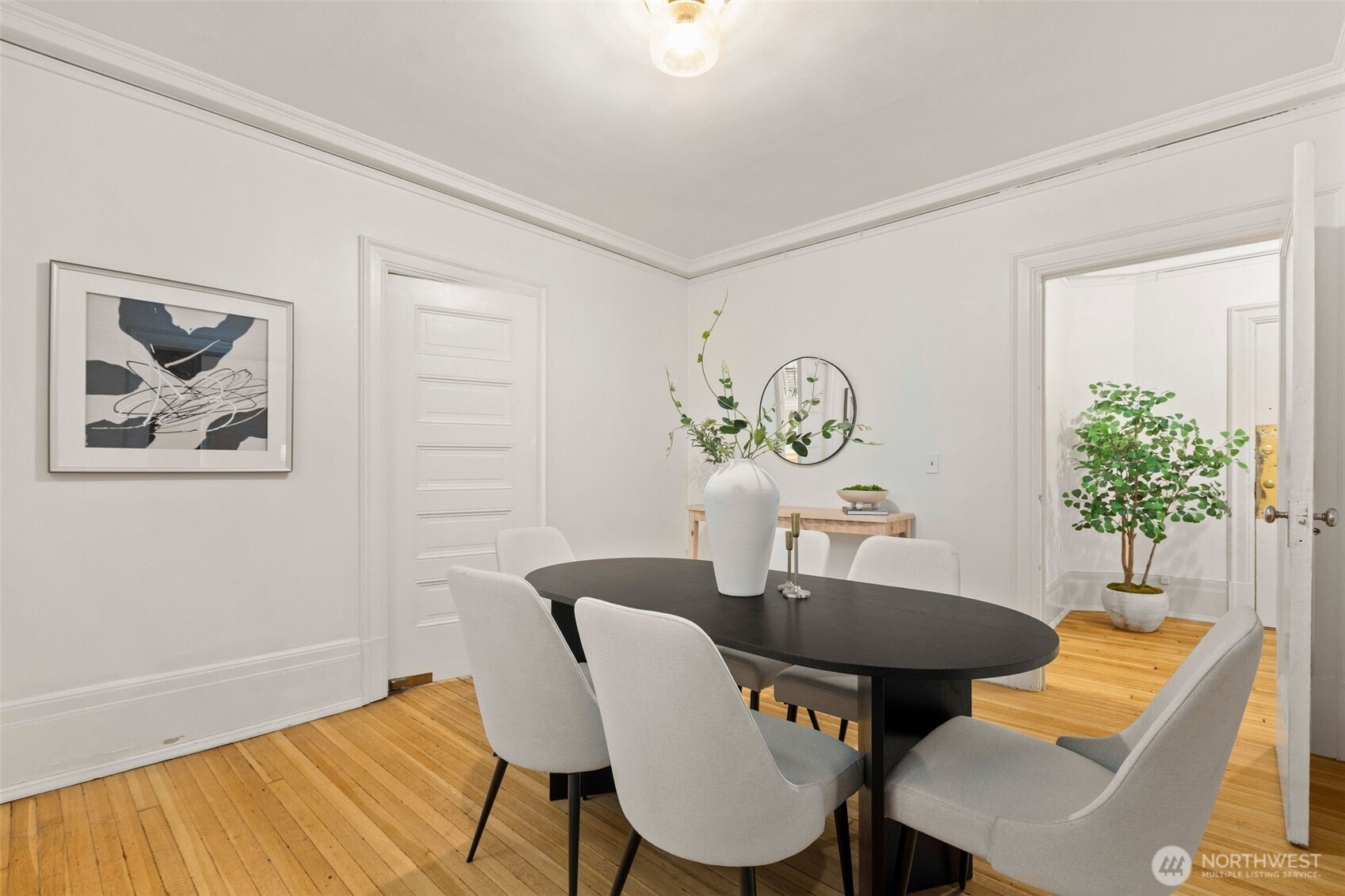 615 Boren Avenue, Unit 6 Seattle, WA 98104 - Photo 12 of 26 a dining room with furniture and window