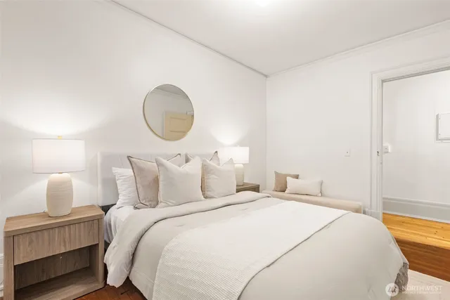 a bedroom with bed and a lamp