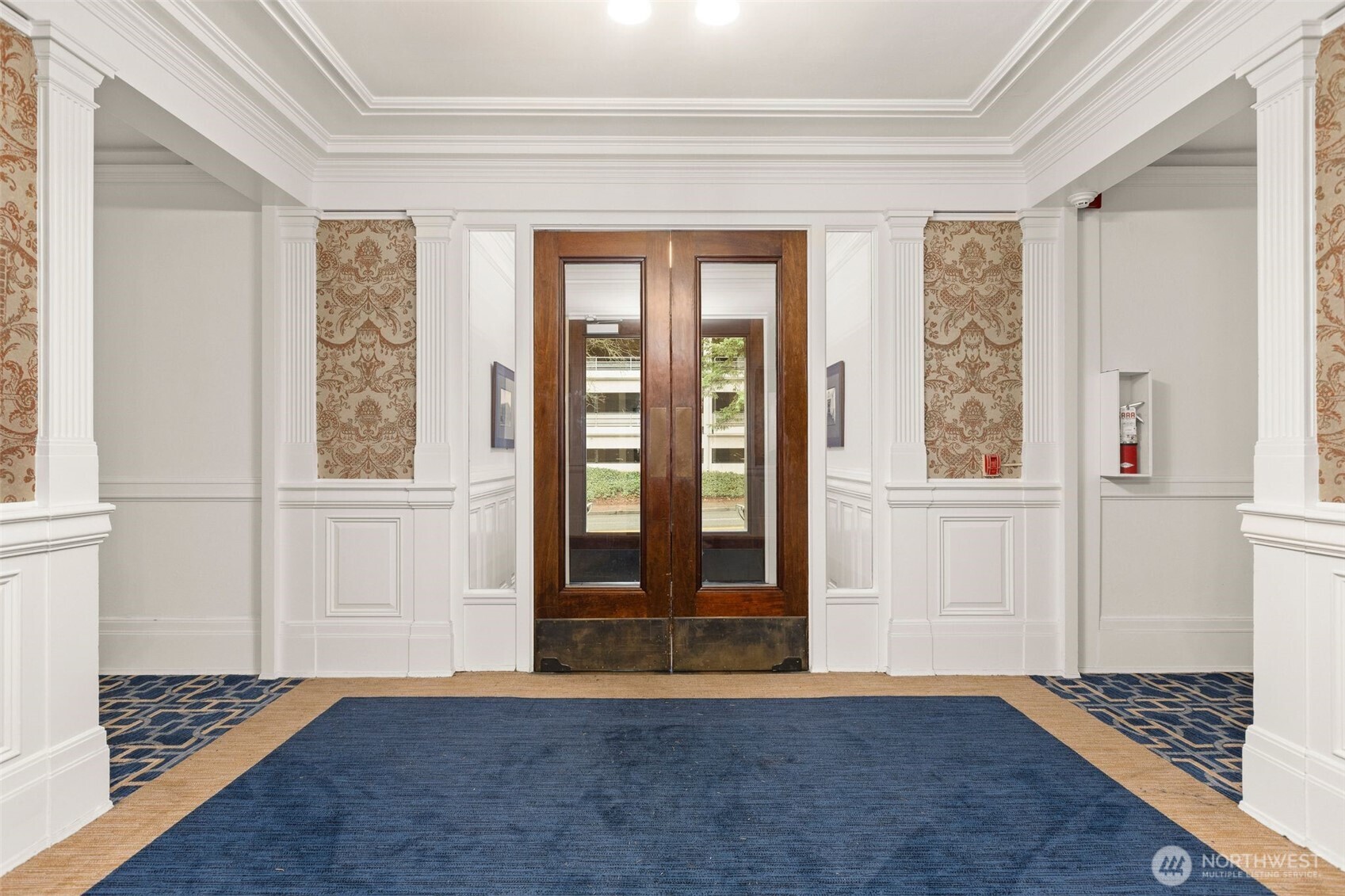 615 Boren Avenue, Unit 6 Seattle, WA 98104 - Photo 2 of 26 a view of an entryway with wooden floor