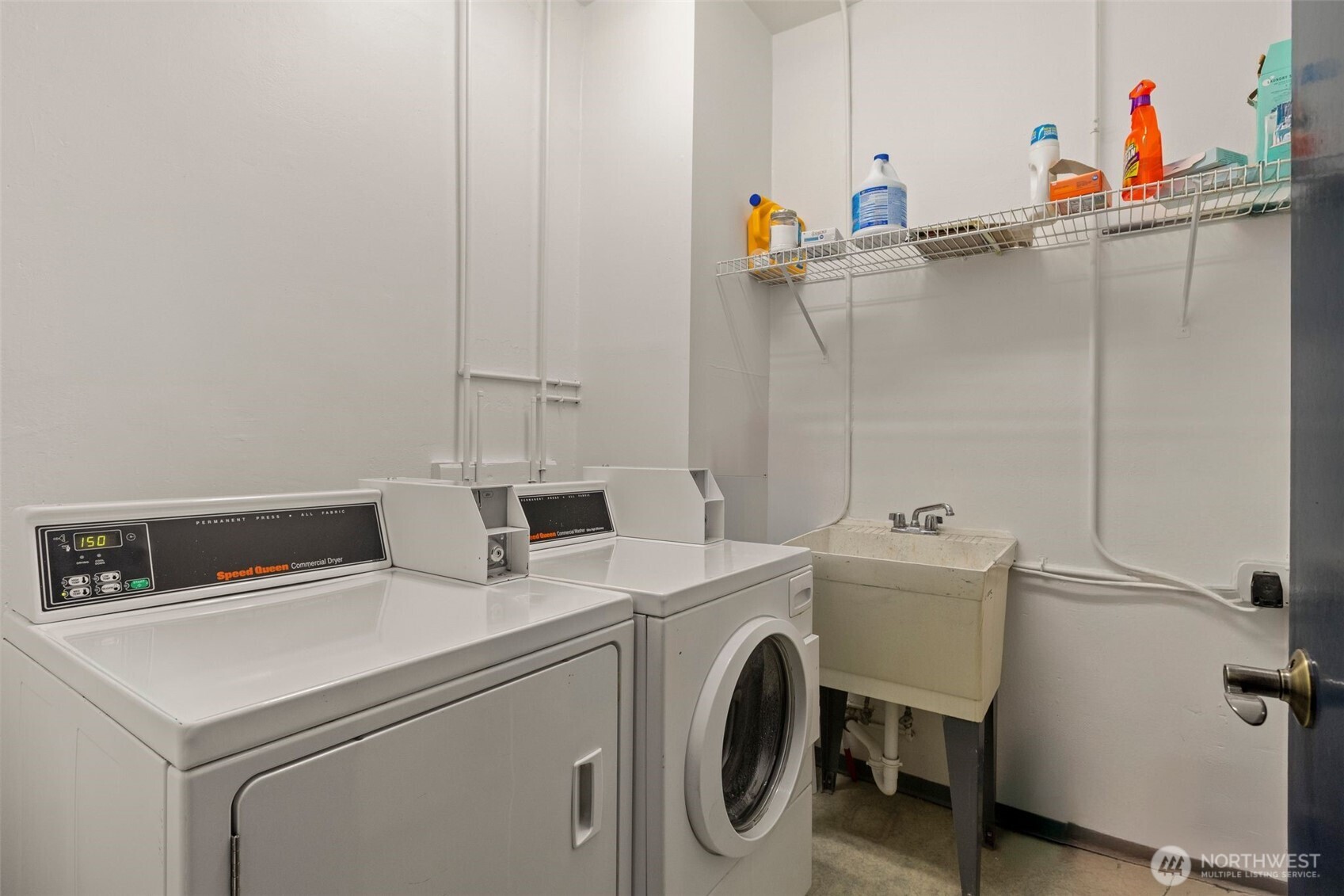 615 Boren Avenue, Unit 6 Seattle, WA 98104 - Photo 21 of 26 a utility room with dryer and washer